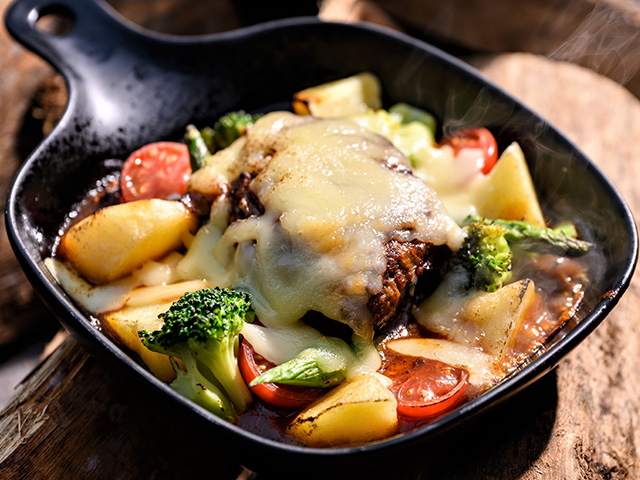 Raclette Cheese Baked with Hamburger and Vegetables