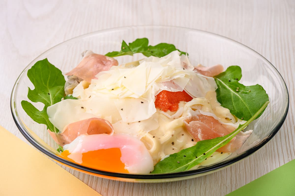 Cold Mentaiko Carbonara Udon with Prosciutto and Arugula